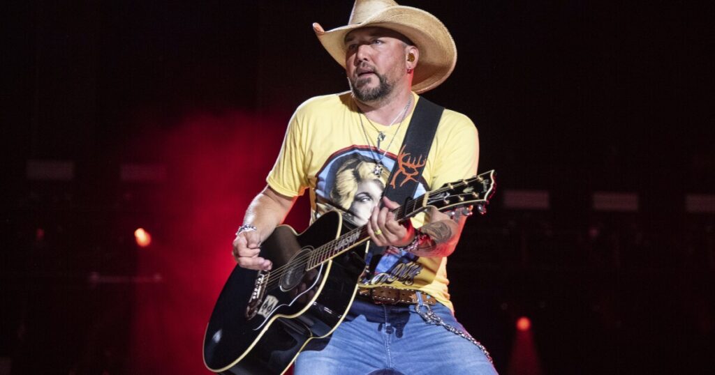 protesters-burn-us-flag-outside-jason-aldean-concert:-‘we-will-try-that-in-a-small-town’