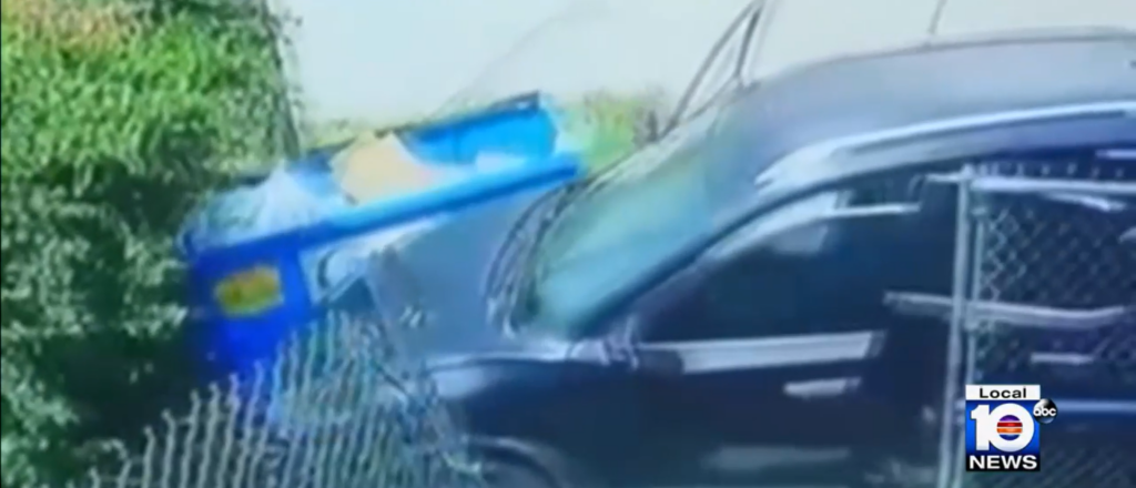 video-footage-shows-suv-rolling-into-dumpster-after-gunman-fired-shots-from-behind-it