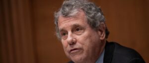 sherrod-brown-backed-biden’s-climate-agenda-now-facing-a-tough-reelection,-he’s-running-away.