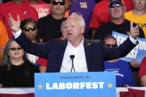 walz-checks-in-on-campaign-staffer-hospitalized-after-motorcade-crash-–-washington-examiner