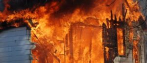 man-rushes-into-burning-home-three-times-to-save-13-people