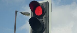 video-shows-man-escape-death-by-inches-as-big-rig-plows-into-his-car