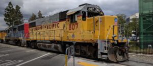 wild-video-shows-train-smash-into-tractor-trailer,-tank.-driver-narrowly-escapes