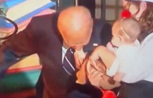 second-victim:-biden-puts-baby’s-entire-foot-in-his-mouth-after-biting-another-baby-at-halloween-celebration-(video)-|-the-gateway-pundit-|-by-cassandra-macdonald