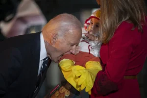 biden-slammed-for-taking-a-bite-out-of-more-than-candy-at-white-house-halloween-–-washington-examiner