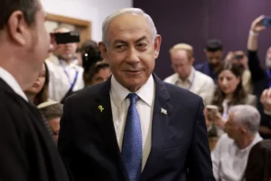 netanyahu-scoffs-at-champagne-and-cigar-bribery-claims-in-trial