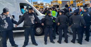 police-break-picket-line,-allow-christmas-deliveries-to-flow-from-distribution-center