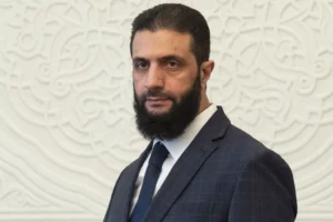 syrian-rebel-leader-says-elections-and-new-constitution-may-take-years