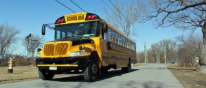 horrifying-video-captures-moment-object-strikes-school-bus-driver-on-highway