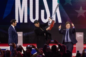 elon-musk-brandishes-chainsaw-at-cpac-and-cuts-down-democrats-–-washington-examiner