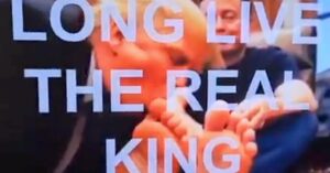 tvs-at-hud-played-an-ai-generated-video-of-donald-trump-kissing-elon-musk’s-feet