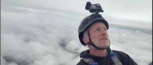 brendan-carr-climbs-above-the-clouds-to-celebrate-one-of-scariest,-hardest-jobs-in-world
