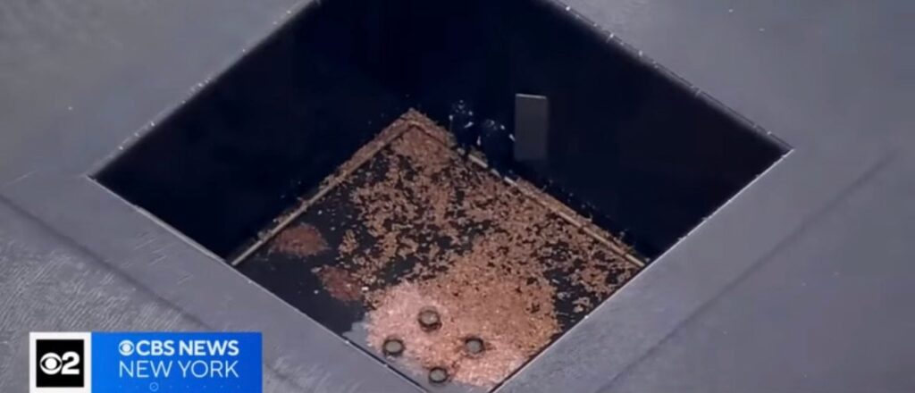man-plunges-into-9/11-memorial-pool,-survives