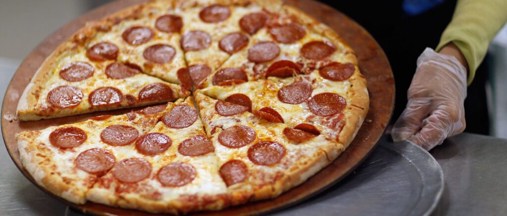 pizza-topped-with-a-loaded-gun-and-pepperoni-leads-to-arrest