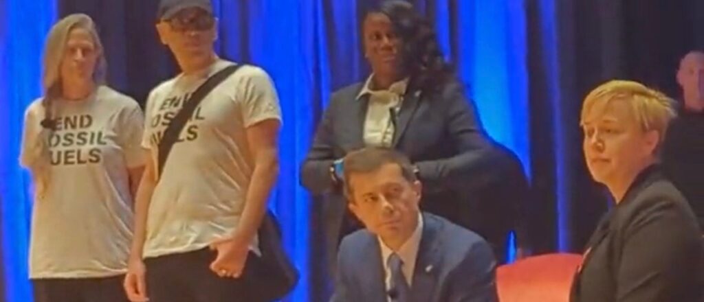 ‘stop-petro-pete!’:-buttigieg-chased-off-stage-by-chanting-climate-protesters