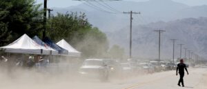 footage-captures-car-taking-direct-hit-as-power-lines-collapse