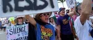 video-appears-to-show-woman-plow-through-anti-ice-protesters,-injuring-3,-police-say