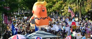 police-arrest-man-after-cell-phone-video-shows-attack-on-man-wearing-inflatable-trump-costume