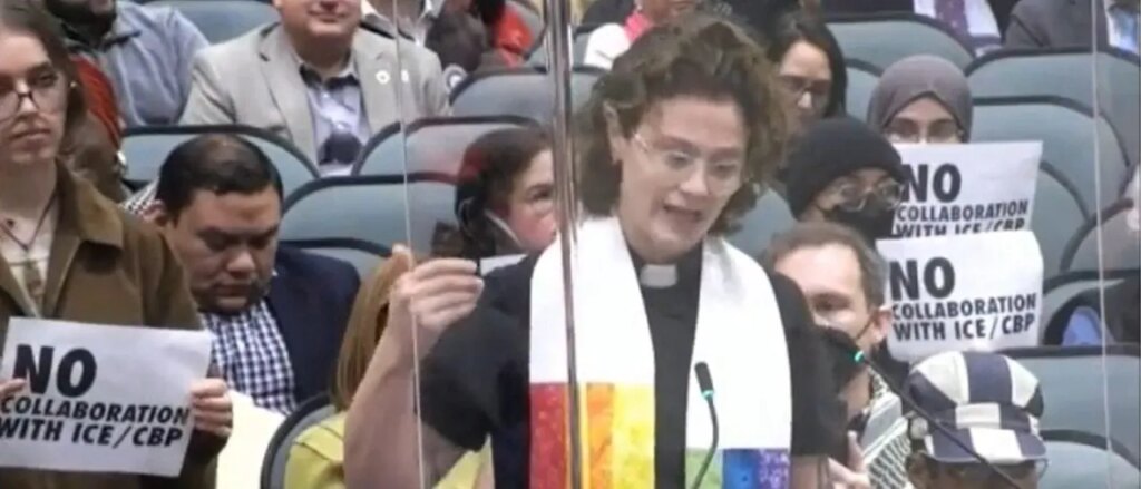 rainbow-clad-female-reverend-compares-ice-supporters-to-judas