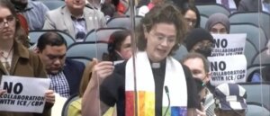 rainbow-clad-female-reverend-compares-ice-supporters-to-judas