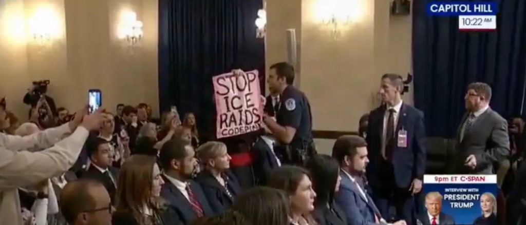 leftist-protester-clad-as-catholic-cardinal-tossed-from-noem-hearing-after-shouting