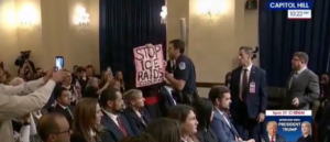 leftist-protester-clad-as-catholic-cardinal-tossed-from-noem-hearing-after-shouting