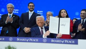 trump-surrounded-by-global-allies-at-the-board-of-peace-signing