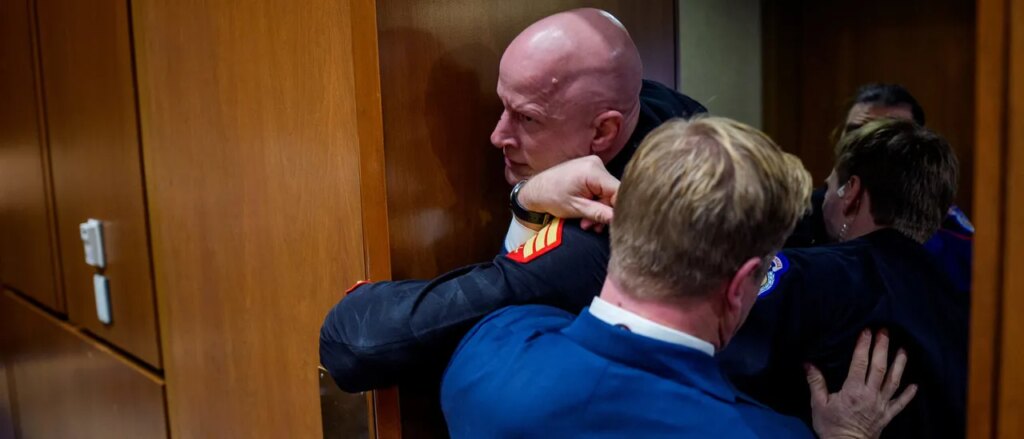 watch-navy-seal-turned-senator-wrestle-shouting-left-wing-protester-who-stormed-hearing