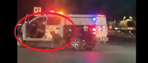 video-shows-naked-man-fighting-cop-before-driving-off,-allegedly-crashing-patrol-cruiser