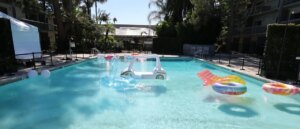 video-shows-ice-officer-spotting-6-year-old-floating-unconscious-in-pool,-jumping-into-action