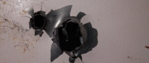 mother-accidentally-shoots-son-thinking-he-was-home-intruder,-police-say