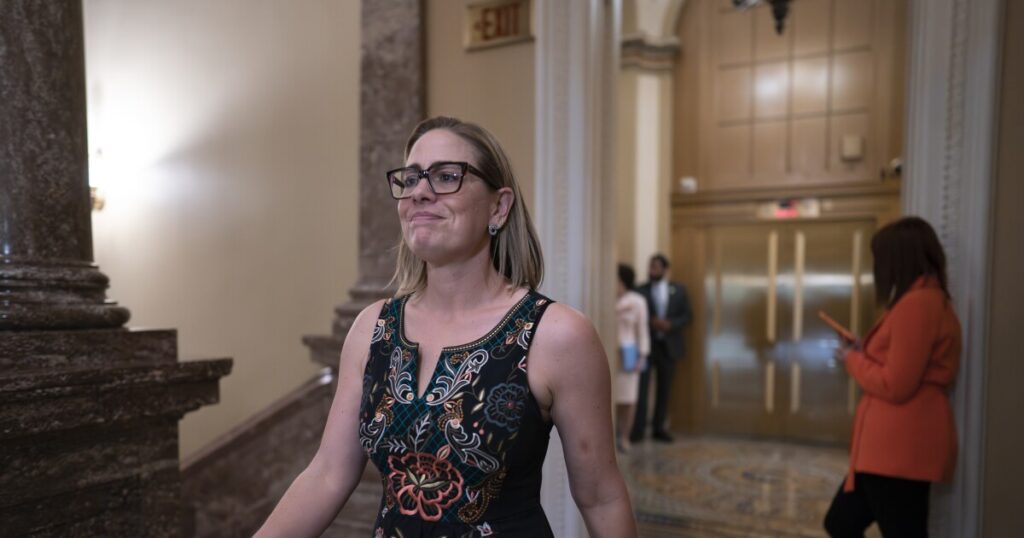 sinema-drops-hint-about-2024-plans-with-victory-lap-on-huge-spending-bill
