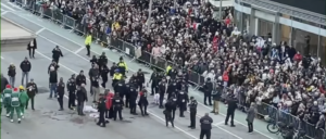 protesters-glue-themselves-to-street-in-attempt-to-disrupt-macy’s-thanksgiving-parade