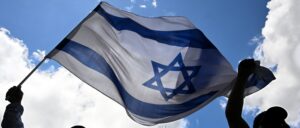 ‘it-was-chaos’:-police-arrest-woman-who-drove-car-into-israeli-christian-protest