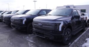 ford-slashes-production-of-f-150-lightning-pickup,-stymieing-ev-push