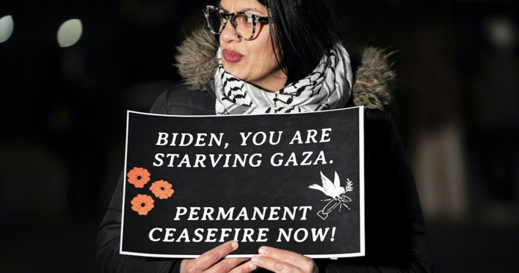 ‘squad’-democrat-rashida-tlaib’s-palestinian-flag-covered-by-protester:-‘shame-on-you’