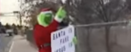 video-shows-man-confront-grinch-outside-new-mexico-kindergarten