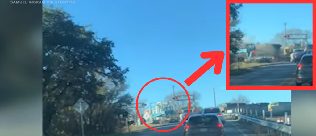 terrifying-video-shows-train-crashing-into-semi-truck,-derailing