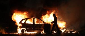 ‘bloodcurdling’:-police-arrest-man-after-deceased-woman-found-in-burned-car-on-his-property:-report