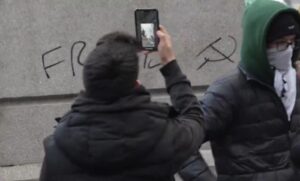 pro-palestinian-protesters-in-new-york-city-vandalize-abe-lincoln-statue-with-communist-symbol