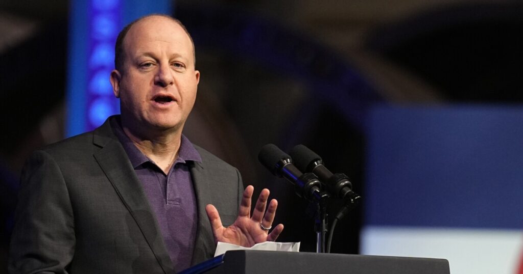 jared-polis-slammed-for-cringe-filled-‘feliz-navidad’-performance-amid-immigrant-crisis