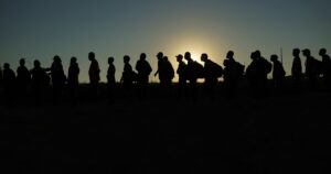 doj-threatens-to-sue-texas-over-enforcement-of-immigration-law