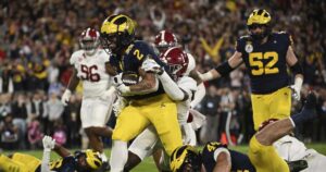 michigan-beats-alabama-27-20-in-overtime-on-blake-corum’s-td-run-to-reach-national-title-game