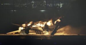 japan-plane-crash:-aircraft-erupts-in-flames-with-379-people-on-board