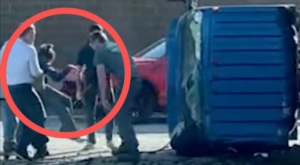 video-shows-good-samaritans-make-dramatic-rescue-of-man-from-burning-truck