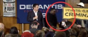 security-guard-tackles-protester-at-desantis-event-in-iowa