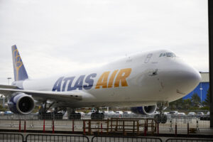 boeing-cargo-plane-catches-fire-midair-after-‘engine-failure’:-video