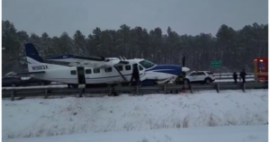 plane-leaving-dulles-international-airport-makes-emergency-landing-on-parkway-(video)