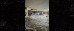 video-shows-floodwaters-smashing-through-army-base-doors,-flooding-dining-room