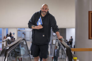john-fetterman-greets-protesters-outside-his-home-by-waving-israeli-flag